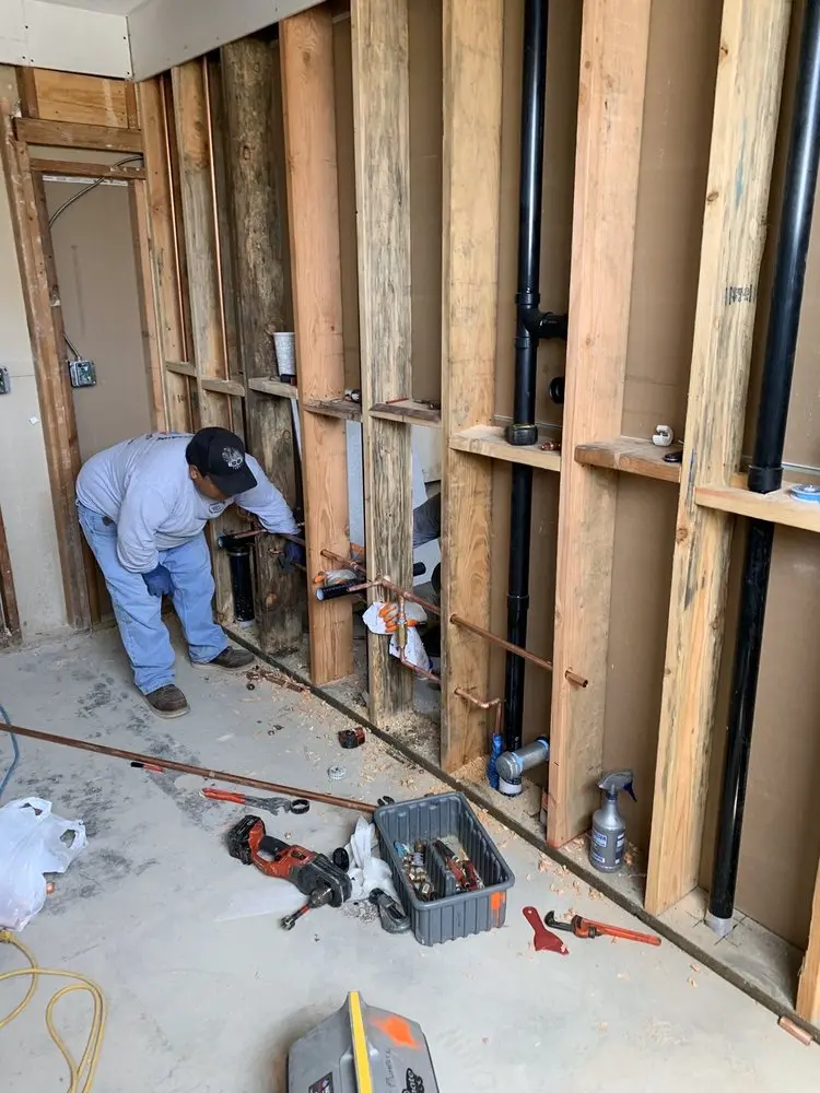 Commercial rough-in plumbing for Water Heater Replacement in Durham